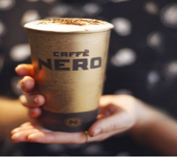A person holding coffee of Caffe Nero